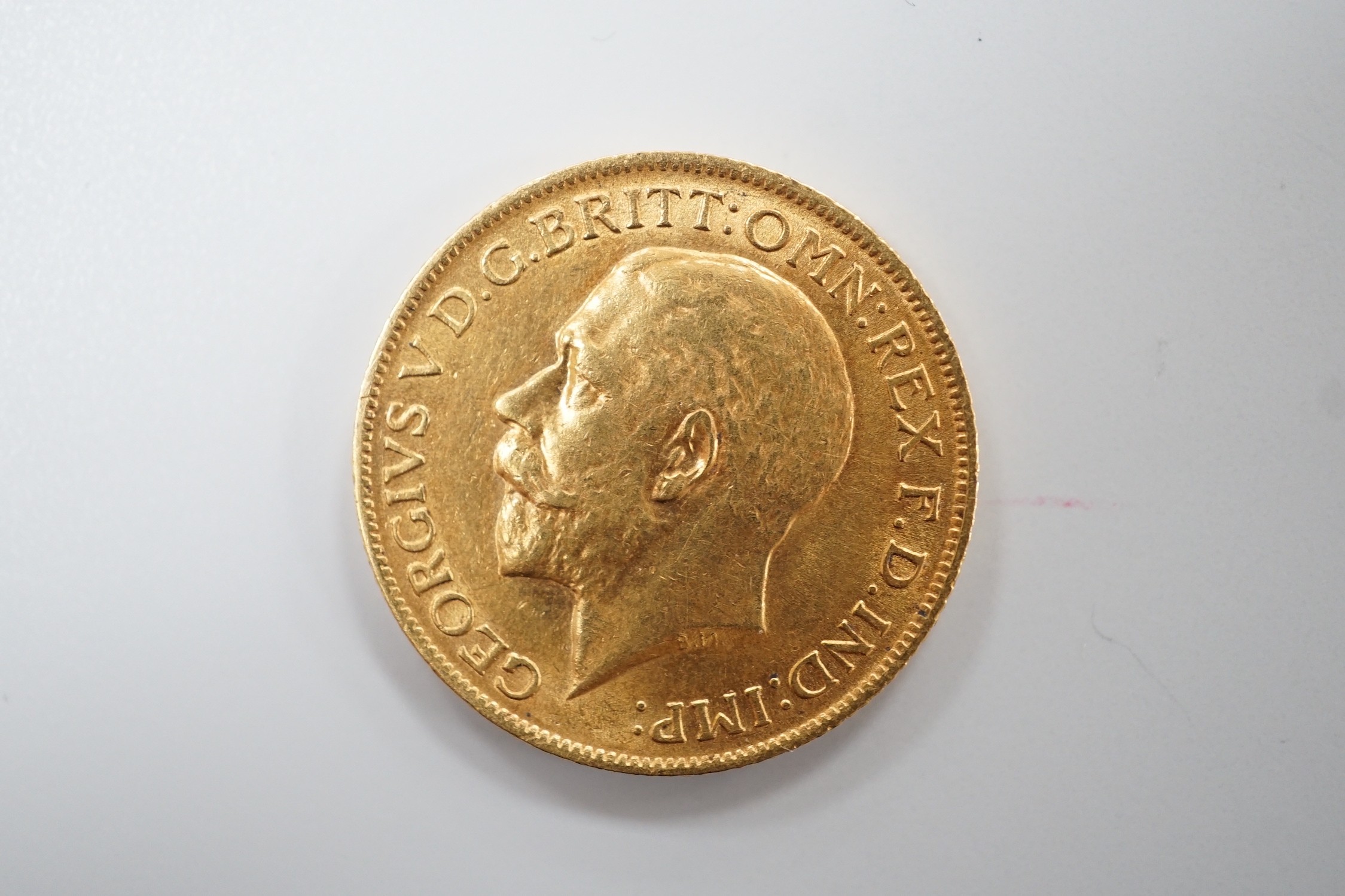 A George V 1912 gold sovereign.